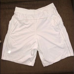Men 7” seam white lululemom shorts